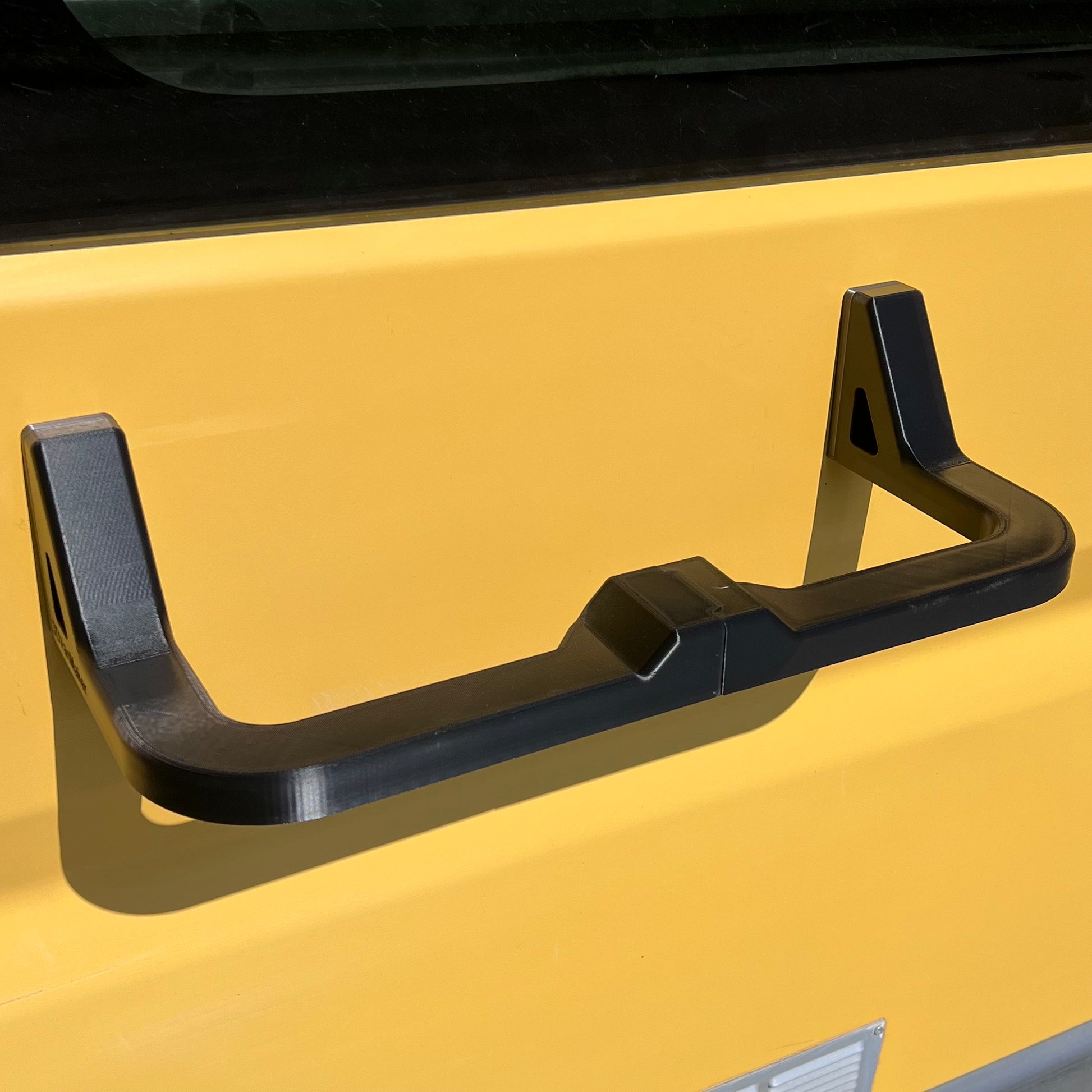 Support pour serviettes 6kg aimanté sur la paroi d'un van.