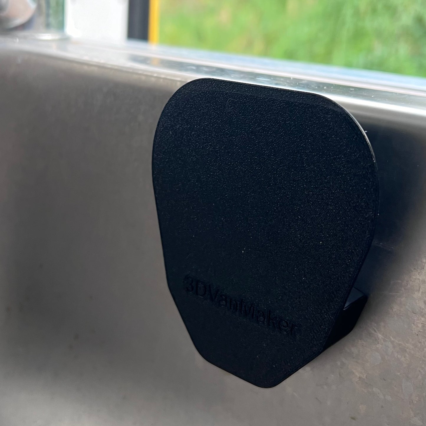 Magnetic sponge holder for stainless steel/granite sink